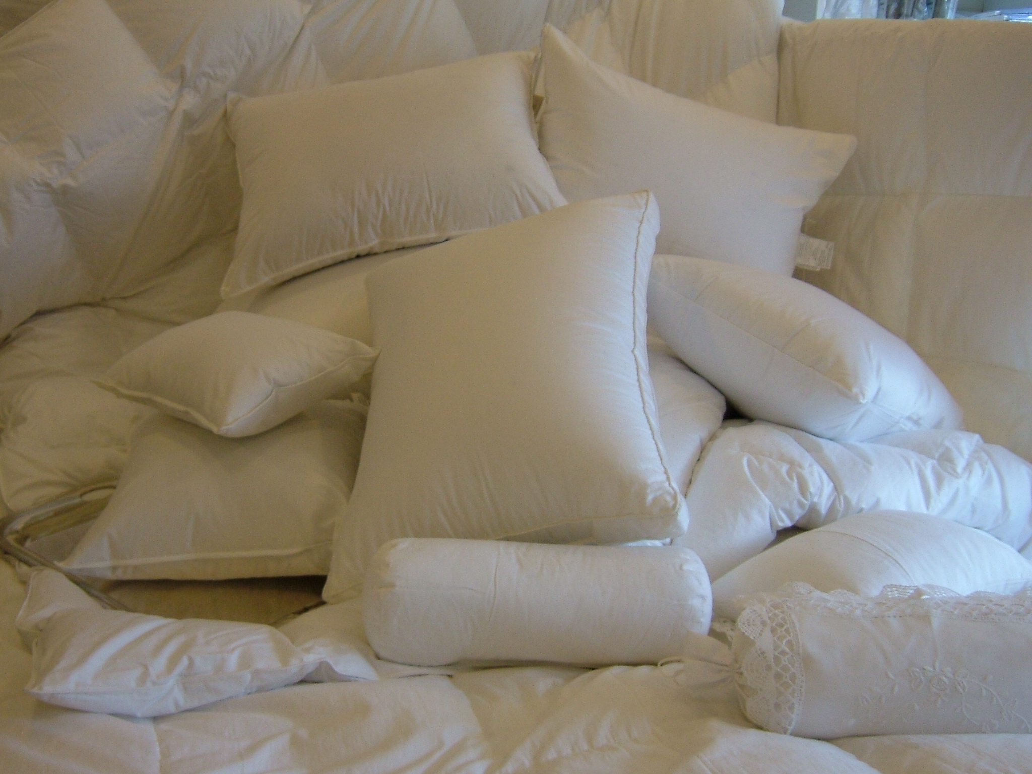 The Down Factory Store offers down bed comforters and discount down